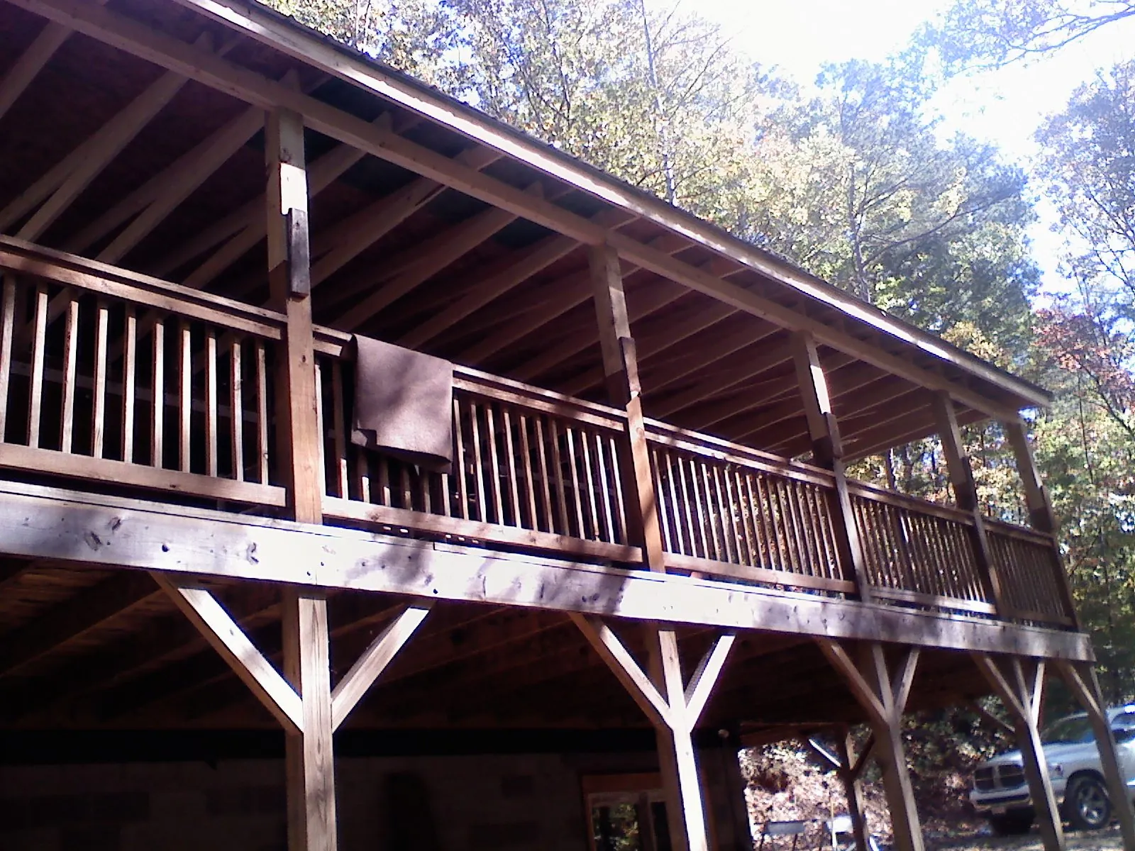 Timber framing under a new elevated porch and deck — Roof Leak Repair in Mountain Ranch by Roofing Brothers